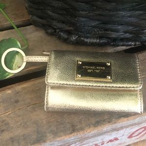 Michael Kors gold coin pouch